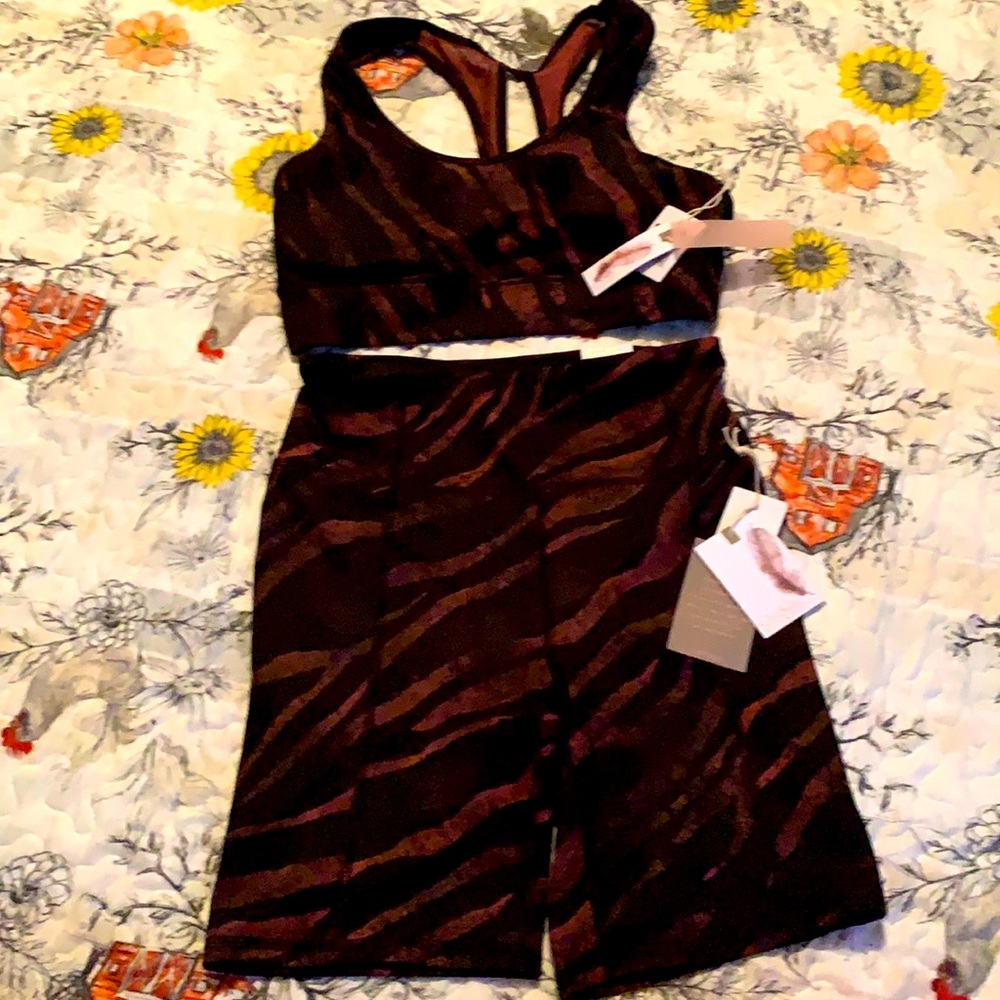 Jessica Simpson bicycle shorts and sports bra